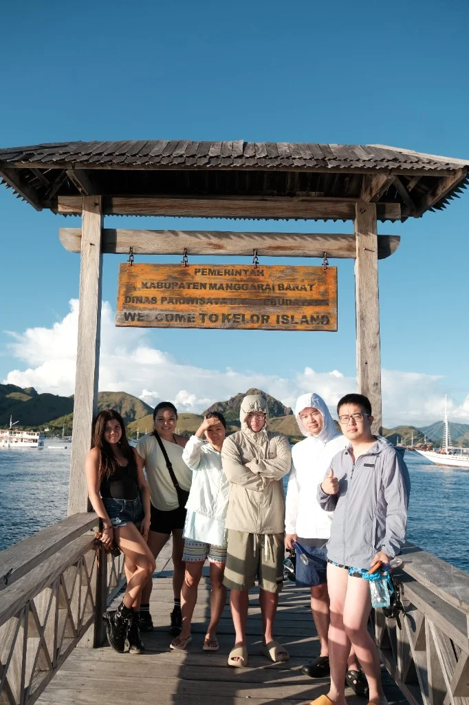 Happy group arriving at the Kelor Island jetty