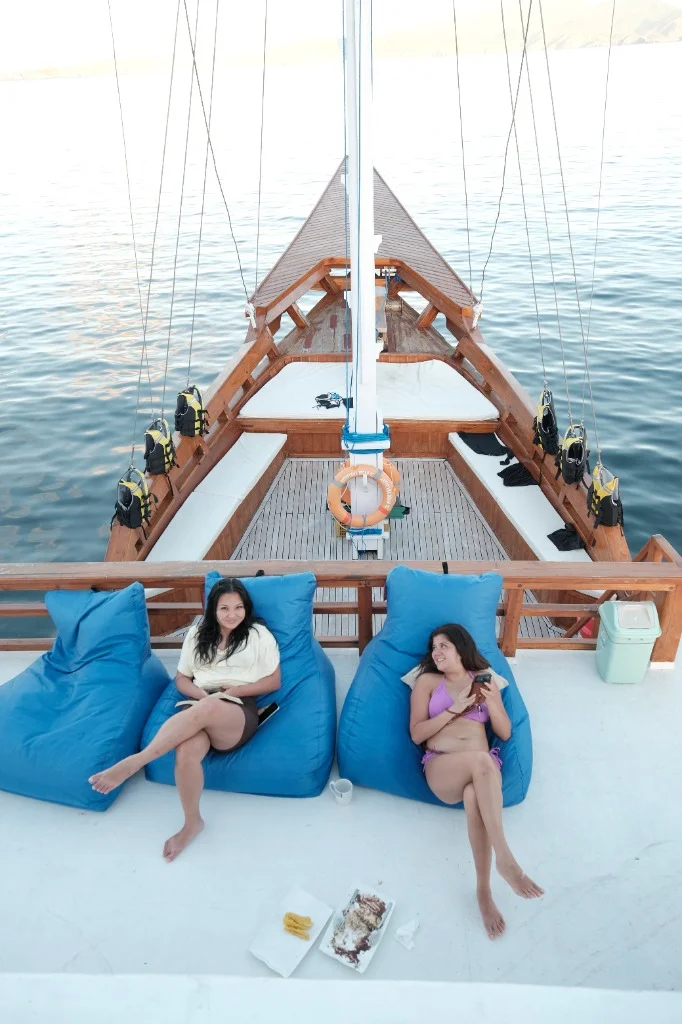 Guests relaxing on beanbags on the spacious sun deck