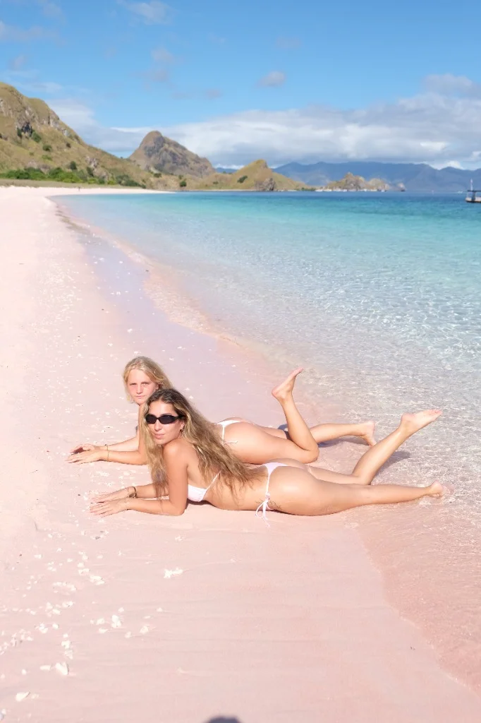 Sunbathing on the iconic Pink Beach
